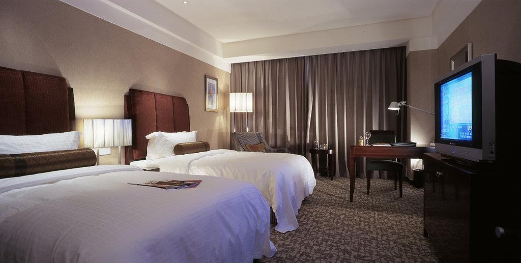 Ruiwan New Century Hotel Тиендзин Стая снимка
